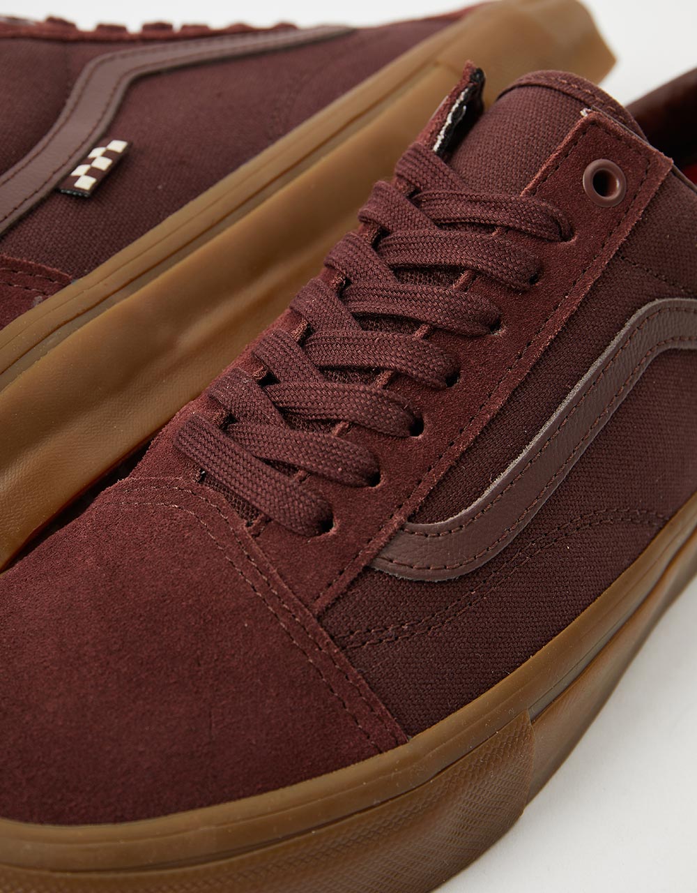 Vans burgundy slip on on sale shoes