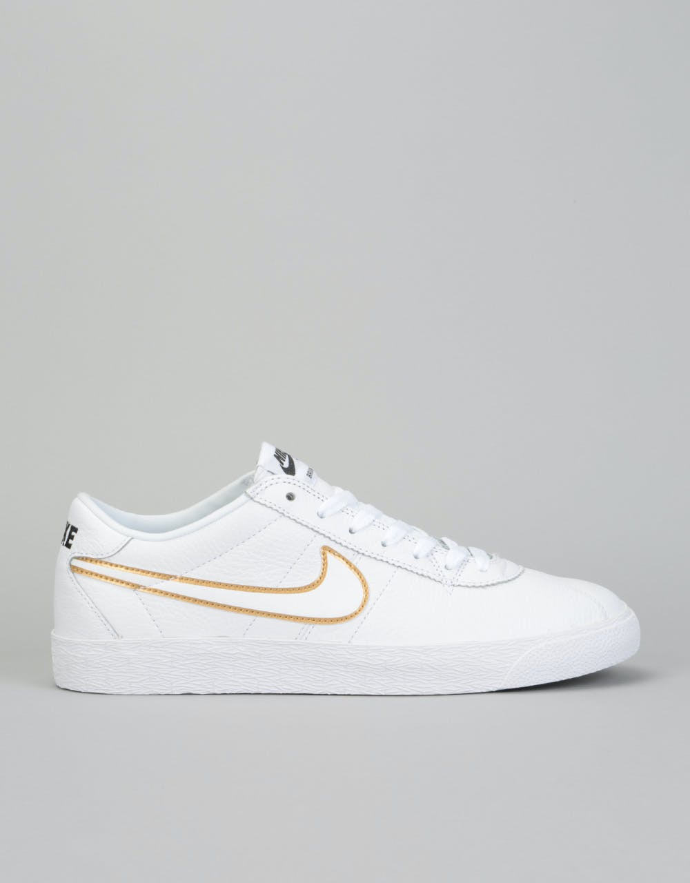 Nike SB Zoom Bruin Premium SE Skate Shoes - White/Wht-Met. Gold-Black –  Route One